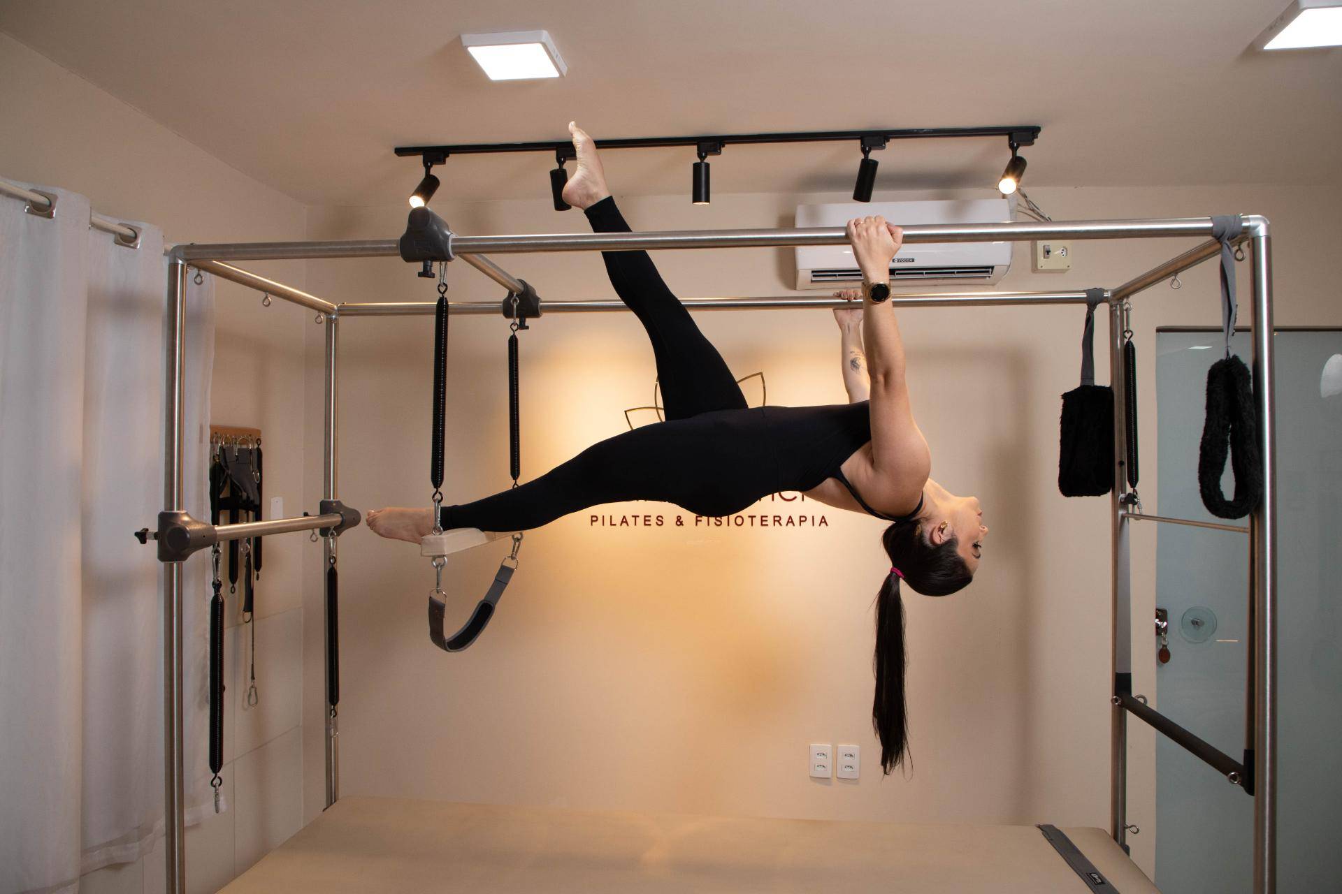 Paciente em aparelho de Pilates